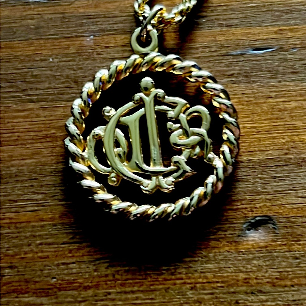 Christian Dior vintage CD logo pendant.